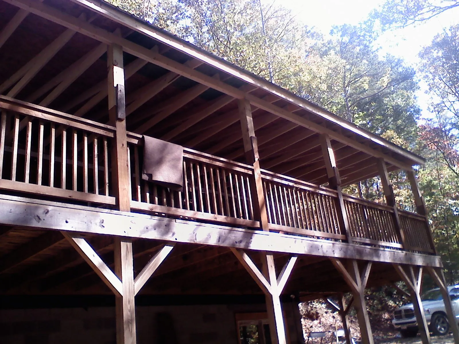 Timber framing under a new elevated porch and deck — Roof Leak Repair in Corsicana by Roofing Brothers